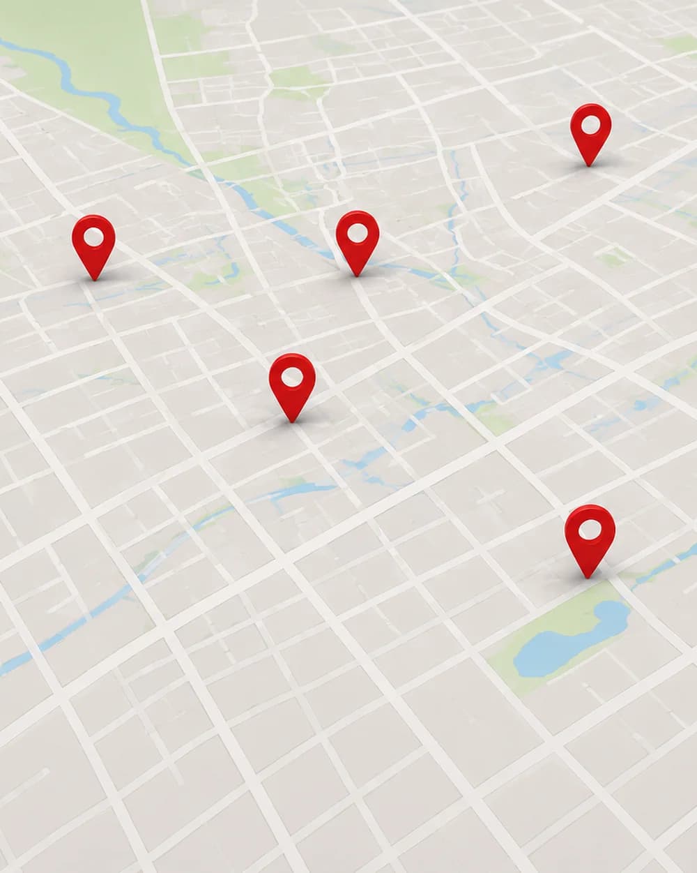 A city map with red location pins marking multiple sites across a portfolio